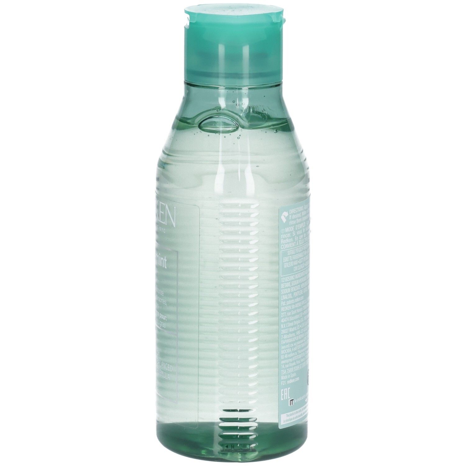 Heldere vloeistof in een doorzichtige fles met turquoise klapdeksel.