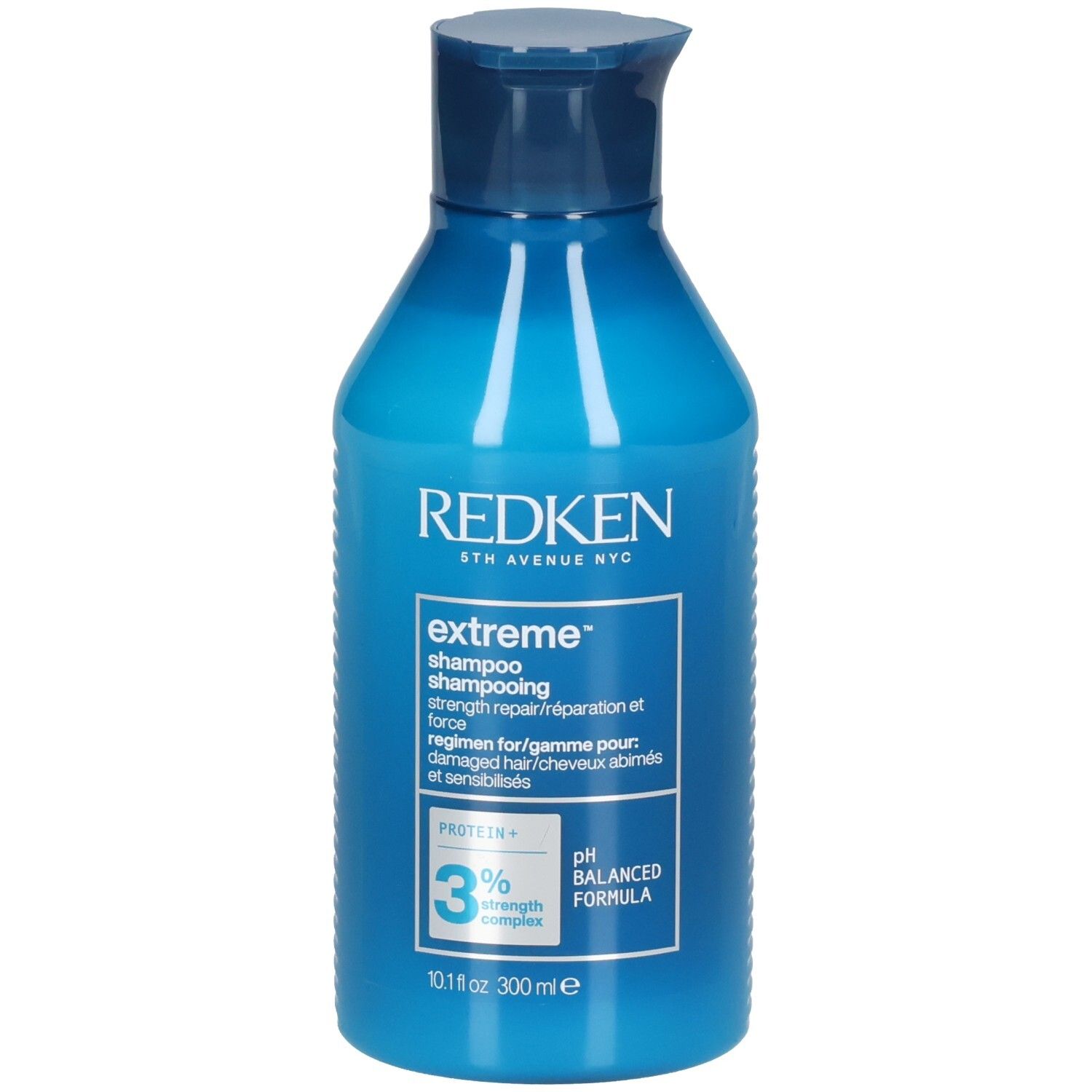Blauwe fles Redken Extreme Shampoo, 300 ml, met Protein Complex en pH-gebalanceerde formule.