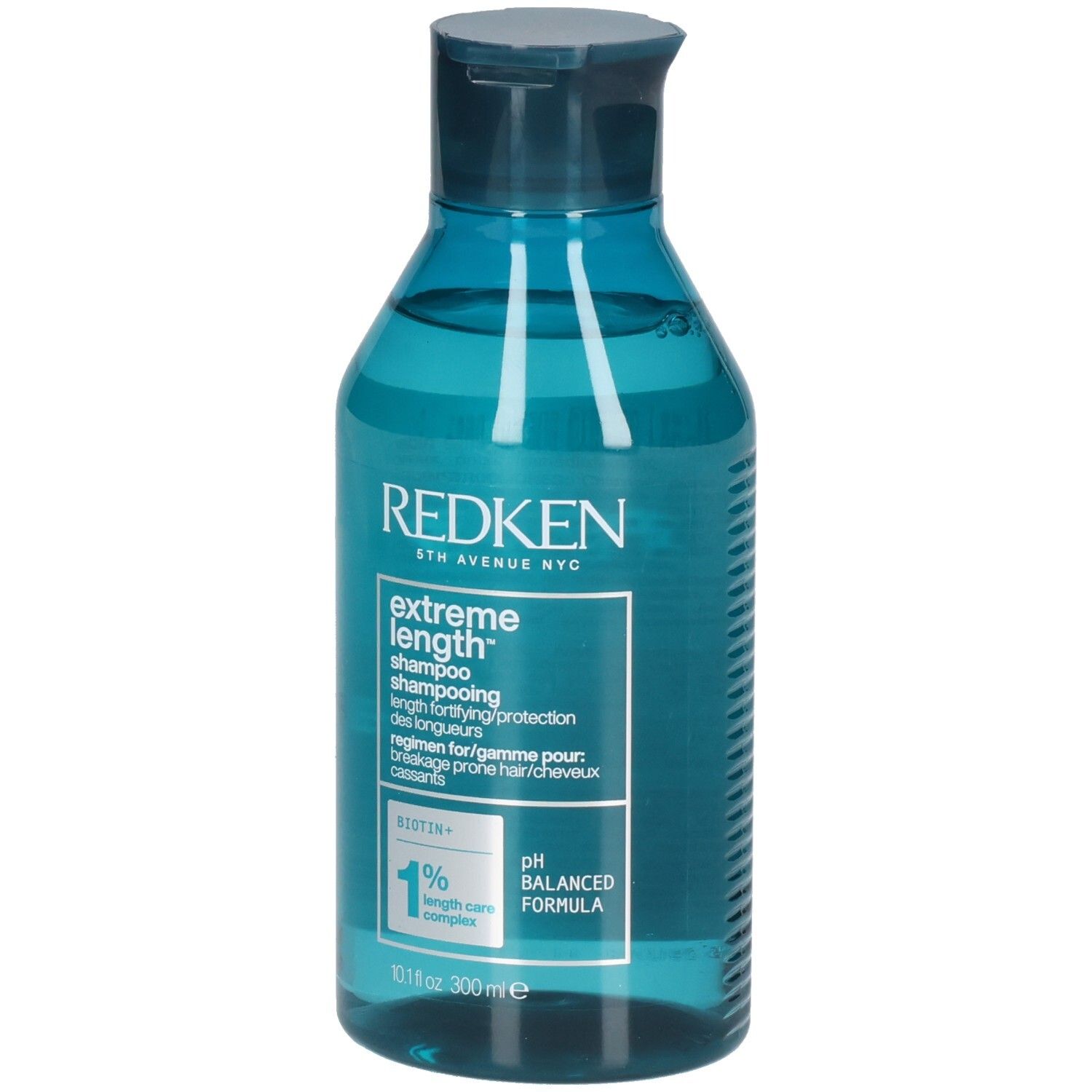 Blauwe, transparante shampoo fles. Opschrift: Redken, Extreme Length Shampoo. Bevat biotine. pH-gebalanceerde formule.