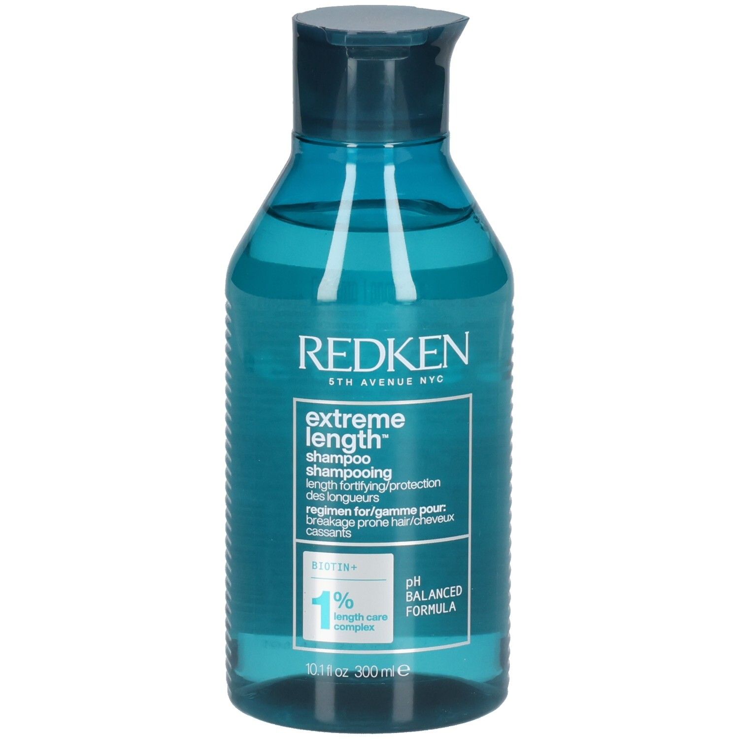 Blauwe, transparante shampoo fles. Opschrift: Redken, Extreme Length Shampoo. Bevat biotine. pH-gebalanceerde formule.