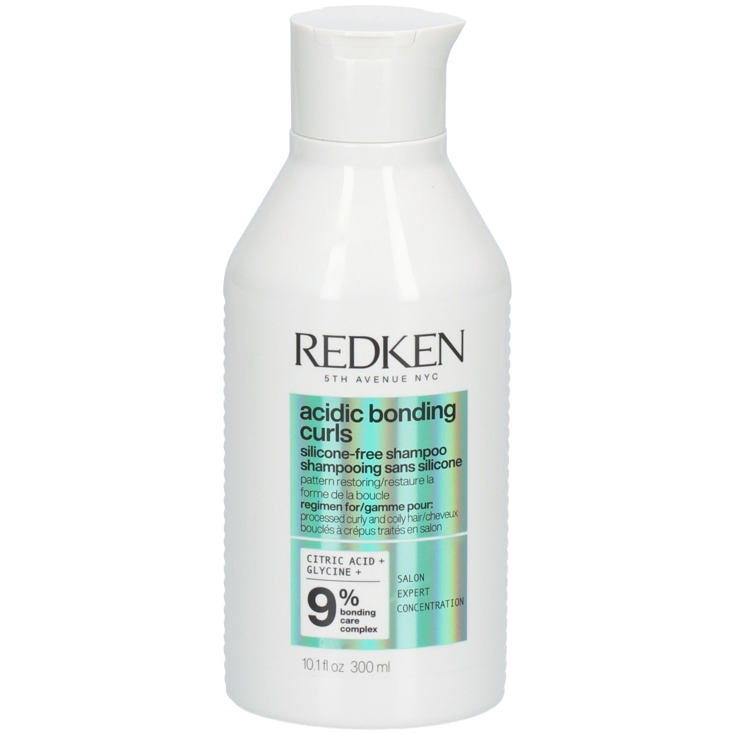 Flacon blanc Redken. Étiquette: Acidic Bonding Curls, shampooing. Contient acide citrique et glycine. 300 ml.