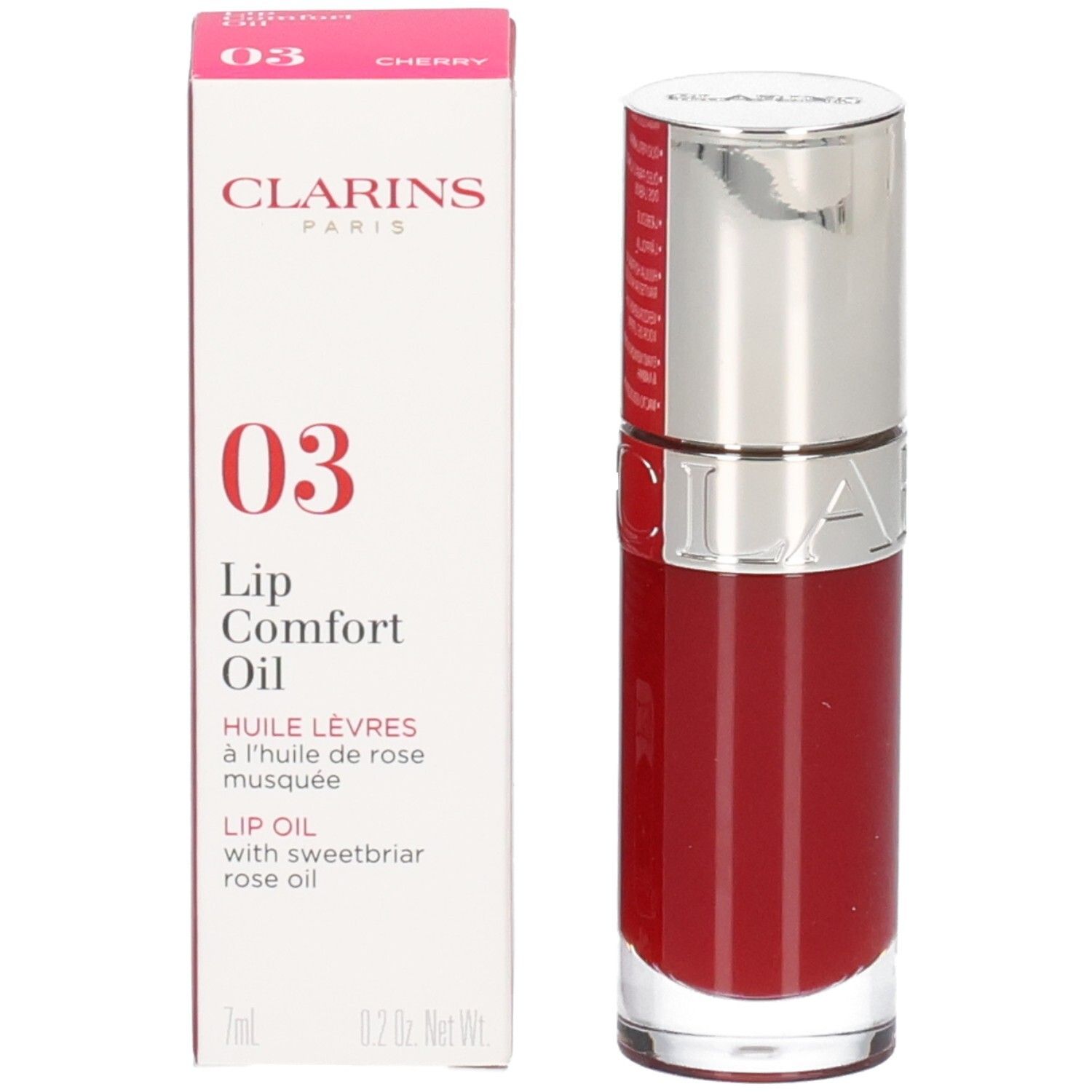 Clarins Lip Comfort Oil 03 - Cherry et son emballage. Le flacon d'huile à lèvres est transparent avec un capuchon argenté.