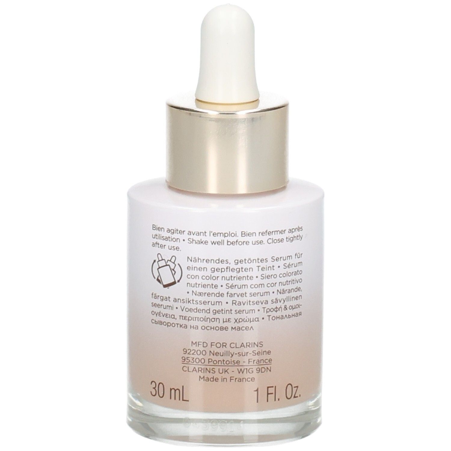 Clarins Tinted Oleo-Serum flesje met pipet, achterkant met gebruiksinstructies en volumeaanduiding 30ml.
