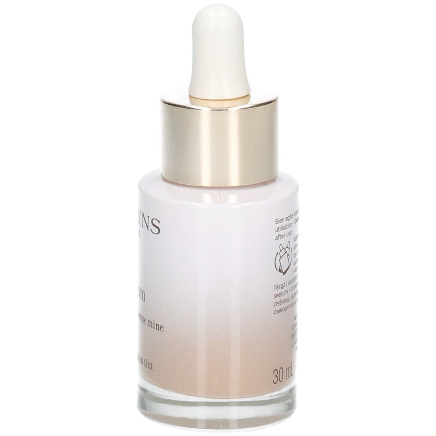 Clarins Tinted Oleo-Serum flesje met pipet, zijkant met gebruiksinstructies en volumeaanduiding 30ml.