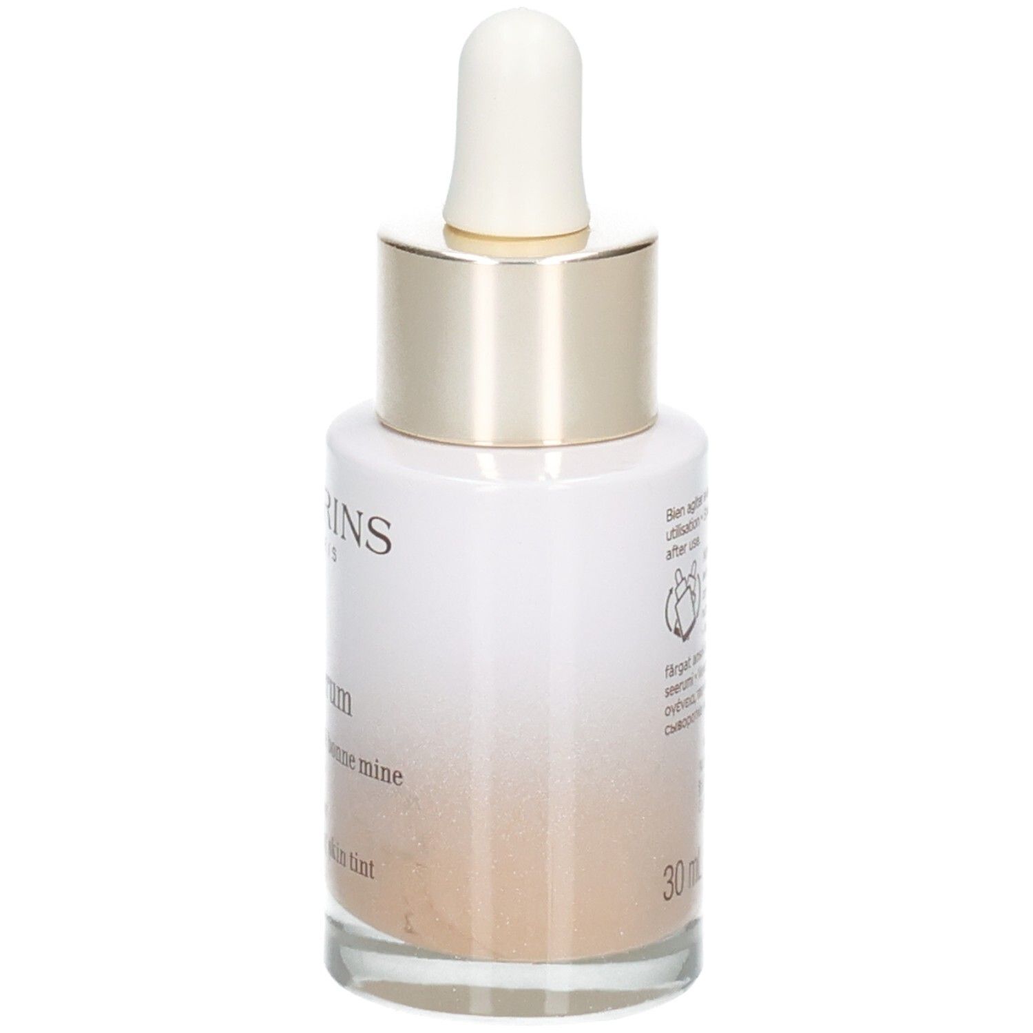 Clarins Tinted Oleo-Serum 04 : flacon en verre avec pipette, bague dorée. Vue arrière détaillée avec texte.