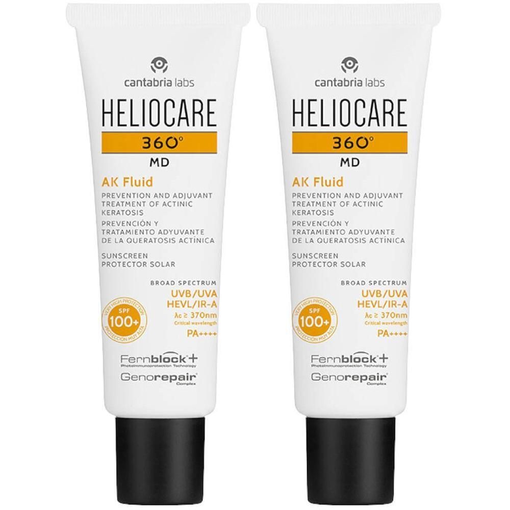 Twee witte tubes. Opschrift: HELIOCARE 360° AK Fluid, SPF 100+. Bevat Fernblock+ en Genorepair.