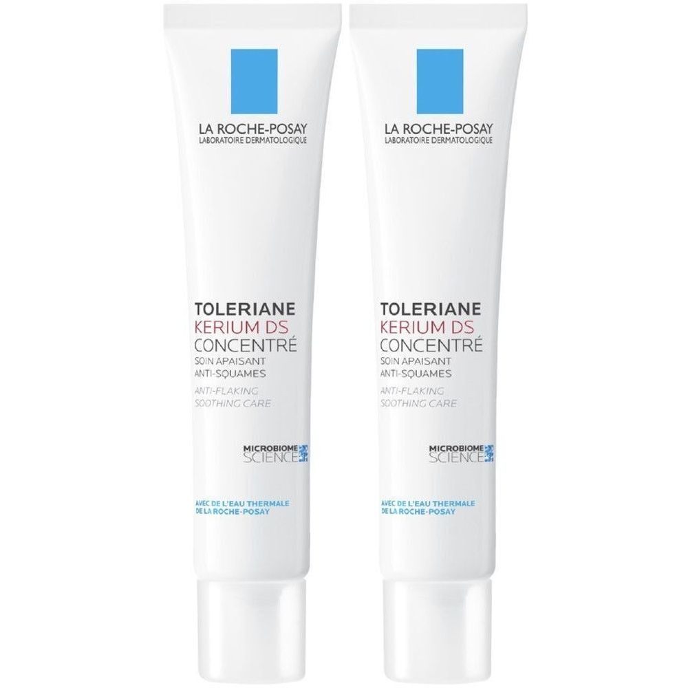 Twee witte tubes met blauwe tekst. Opschrift: La Roche-Posay, Toleriane Kerium DS Concentré, verzachtende anti-schilfers.