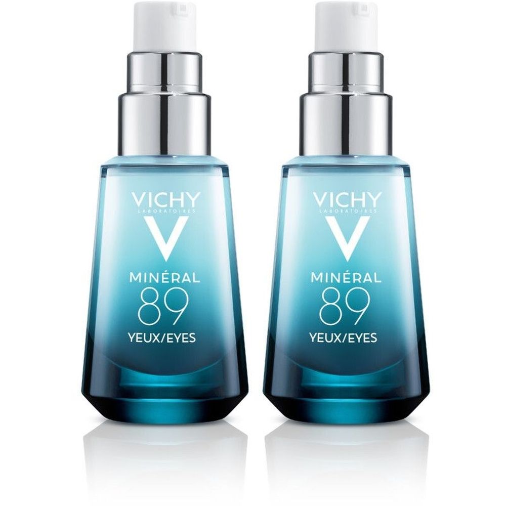 Twee flacons met blauw vloeibaar product. Opschrift: Vichy, Minéral 89, Yeux/Eyes. Witte en zilveren elementen.