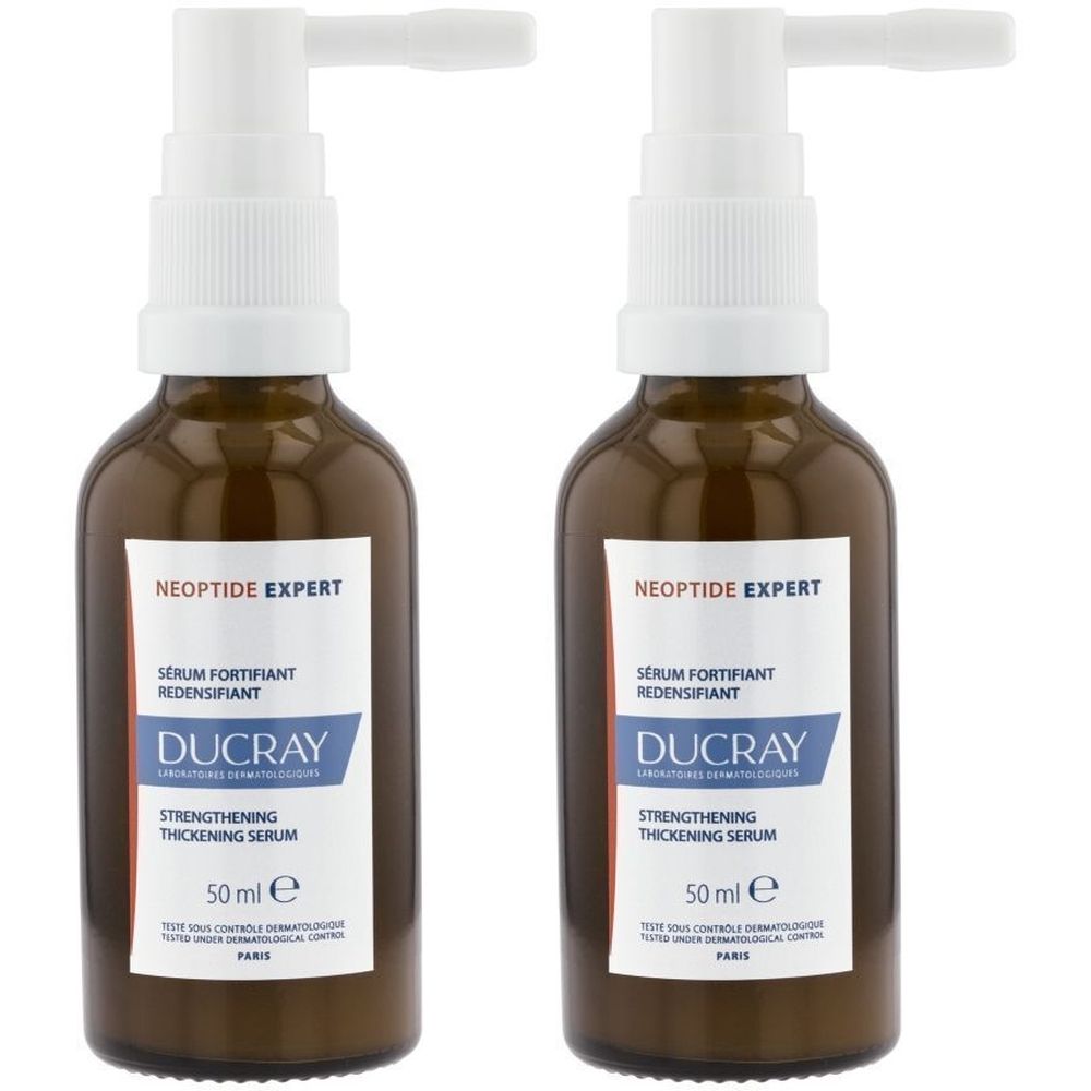 Deux flacons en verre brun avec vaporisateur blanc. Étiquette : NEOPTIDE EXPERT, DUCRAY, Sérum fortifiant redensifiant, 50 ml.