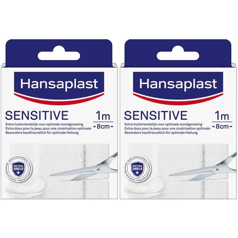 Twee Hansaplast Sensitive verpakkingen. Opschrift: 1m x 8cm. Bevat pleisters en schaar. Logo: Bacteria Shield.
