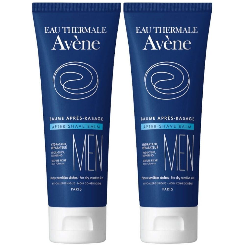 Twee blauwe tubes aftershave balsem. Opschrift: Eau Thermale Avène, Baume Après-Rasage, Men. Voor droge, gevoelige huid.