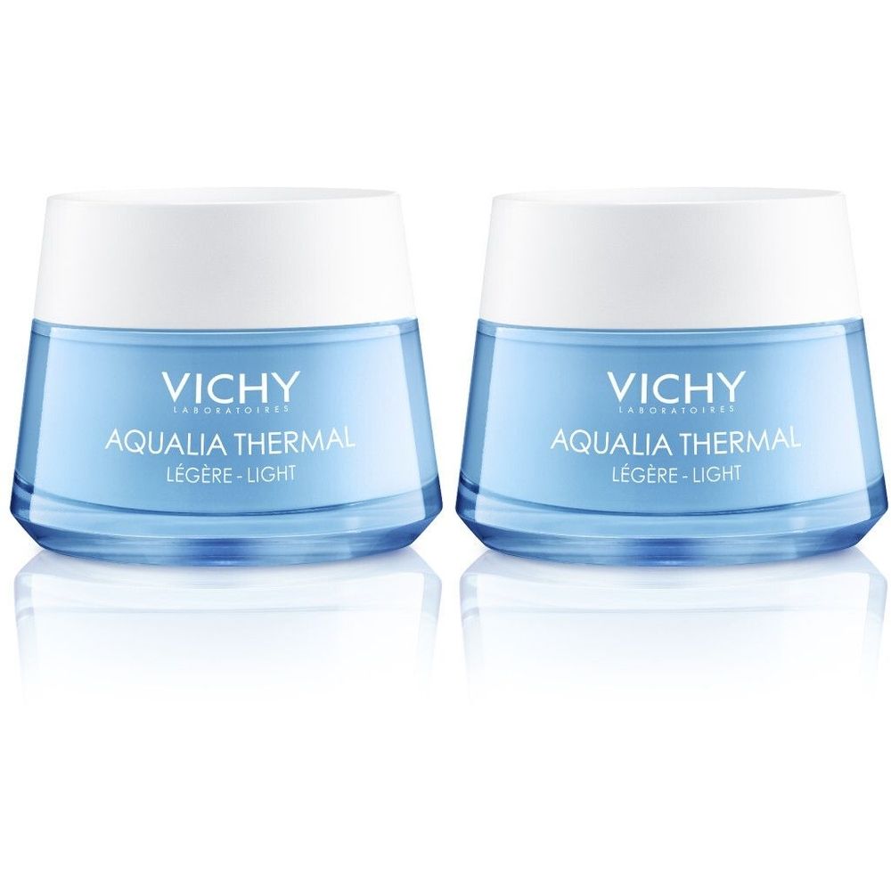 Twee blauwe crèmetiegels met witte deksels. Opschrift: Vichy, Aqualia Thermal, Légère-Light.