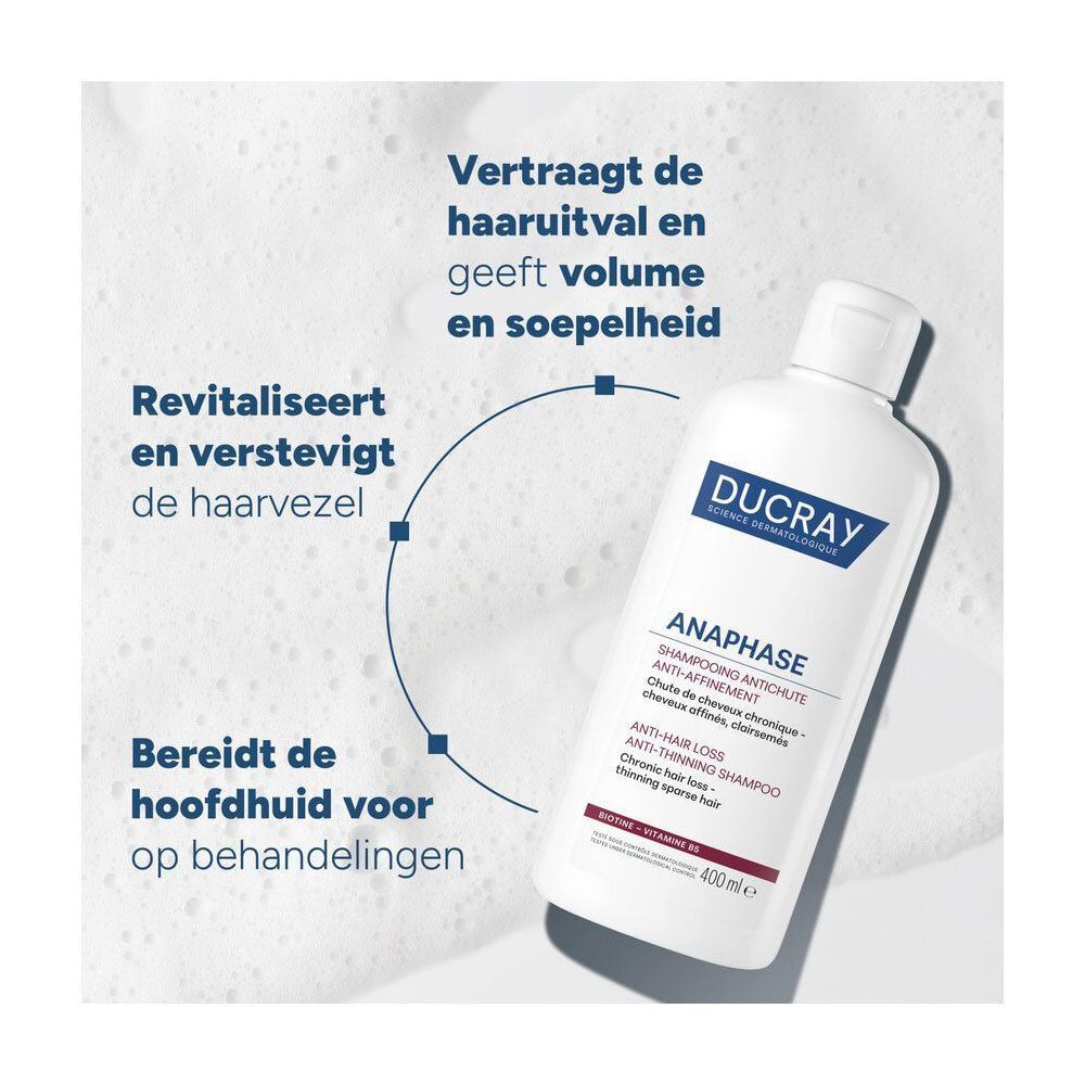 Fles Ducray Anaphase Shampoo. Tekst: Vertraagt haaruitval en geeft volume en soepelheid. Revitaliseert en verstevigt haarvezel.