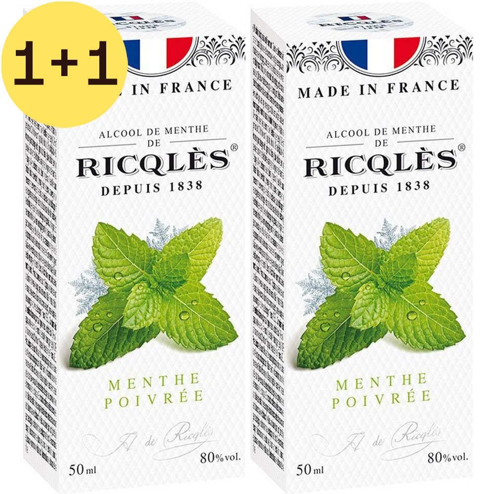 Twee witte dozen met opdruk. Boven: Franse vlag, « Made in France ». Onder: muntbladeren, « Ricqlès » en « Menthe Poivrée ».