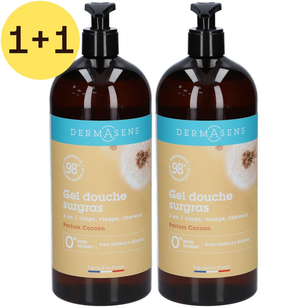Twee flessen douchegel met zwarte pomp. Opschrift: DermAsens, Gel douche surgras, Parfum Cocoon. Gele stickers met 1+1.