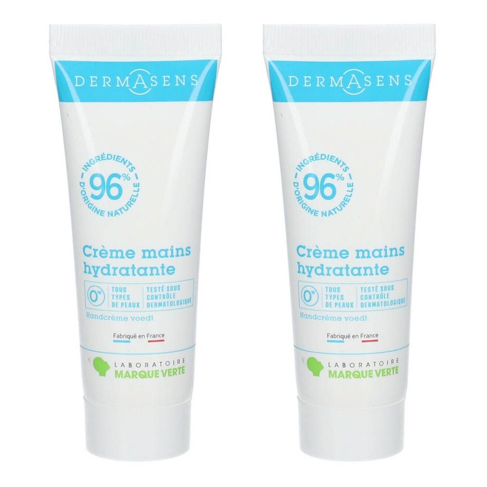 Deux tubes de crème pour les mains blancs avec texte bleu. Chaque tube affiche "DERMASENS", "Crème mains hydratante". Un cercle jaune indique "1+1 GRATUIT".