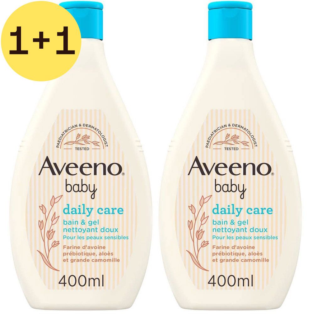 Deux flacons Aveeno Baby Daily Care Bain & Gel Nettoyant Doux. Offre 1+1 gratuit. Flacons blancs, bouchon bleu, 400ml.