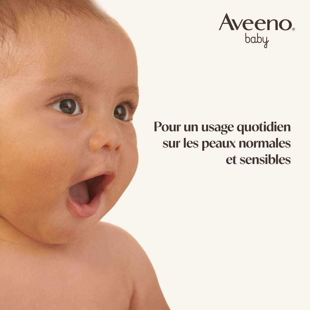 Visage de bébé avec la bouche ouverte. Texte: Pour un usage quotidien sur les peaux normales et sensibles. Logo Aveeno Baby.