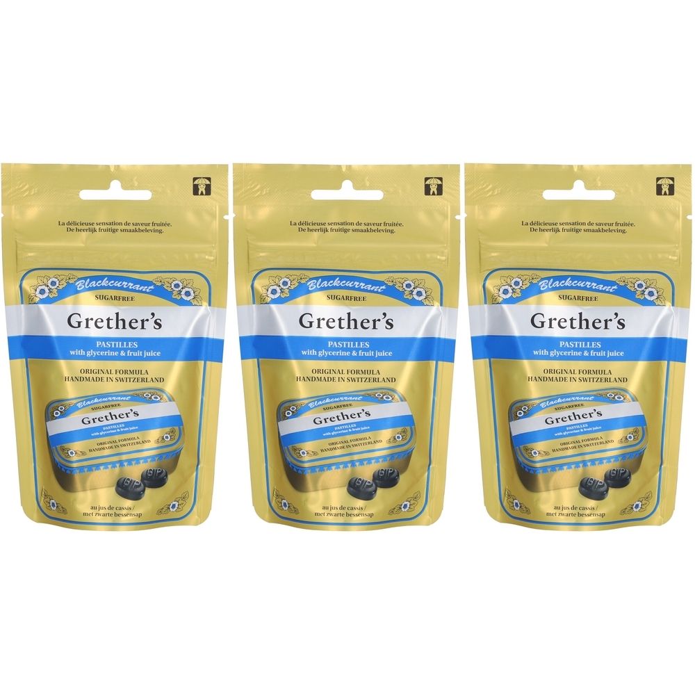 Drie zakjes Grether's pastilles. Gouden verpakking met blauw-witte tekst. Zwarte bes, met glycerine & vruchtensap.