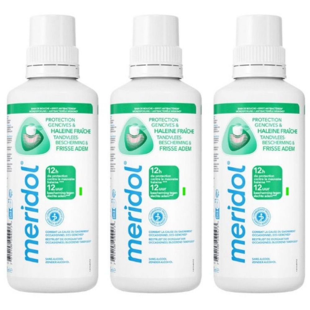 Drie witte flessen met groene etiketten. Opschrift: meridol, Protection Gencives & Haleine Fraîche, 12u bescherming.