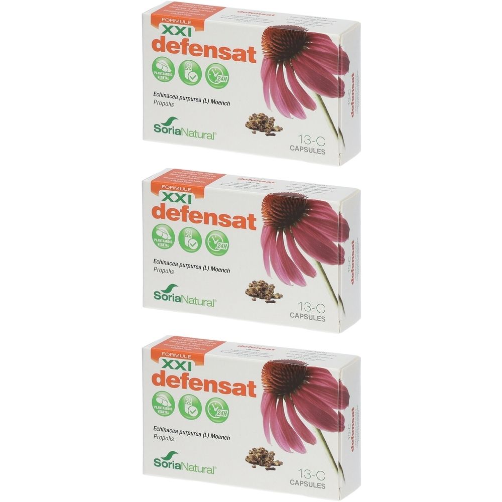 Drie dozen Soria Natural® 13-C Defensat XXI. Witte dozen met productnaam, logo en afbeelding van een bloem. Opschrift: 13-C Capsules.