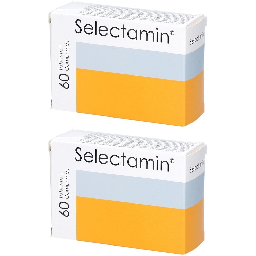 Twee dozen Selectamin tabletten. Witte dozen met blauwe en gele kleuren. Opschrift Selectamin en 60 tabletten.