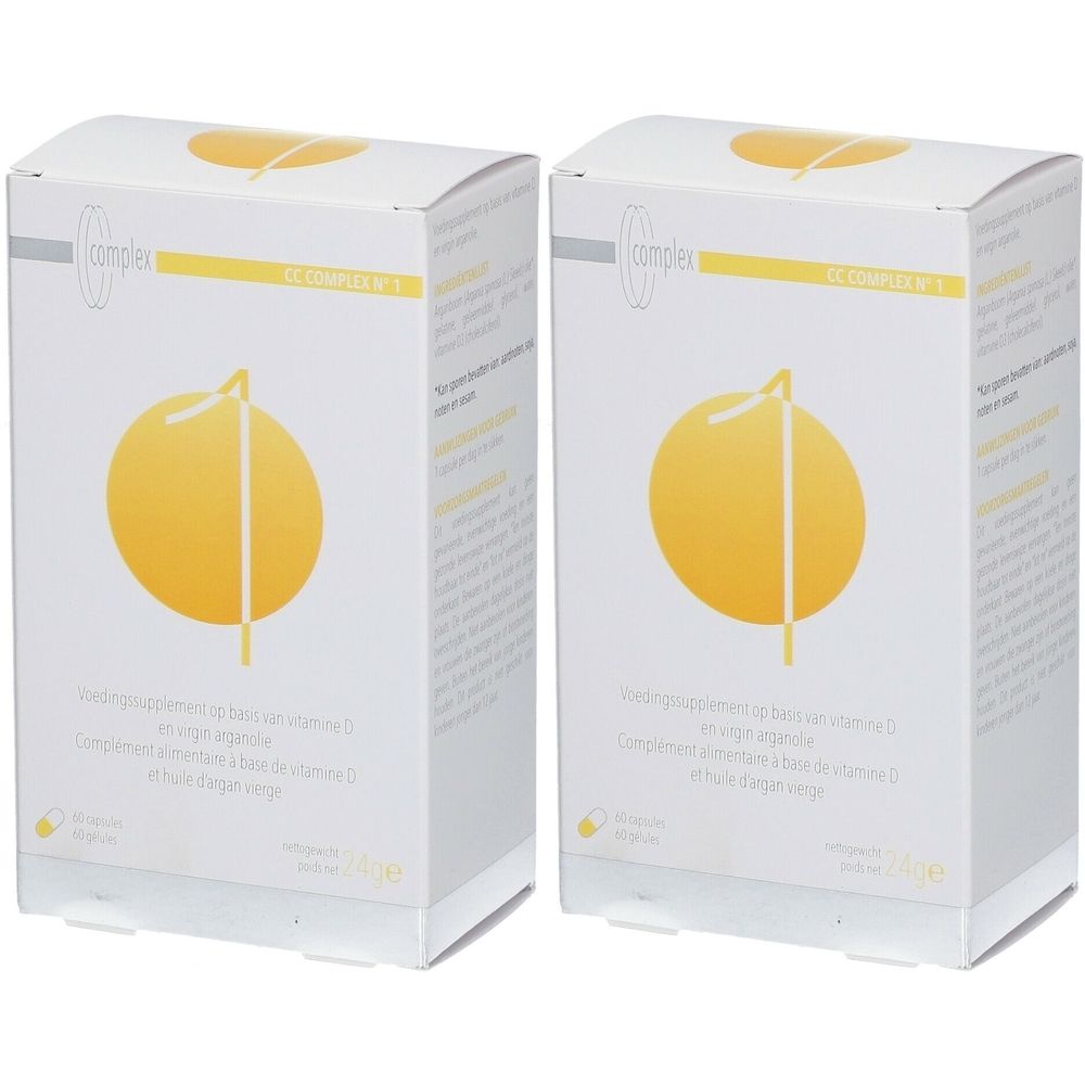 Deux boîtes blanches avec un design de cercle jaune. Inscription: CC Complex N°1 Vitamine D. Texte en plusieurs langues.