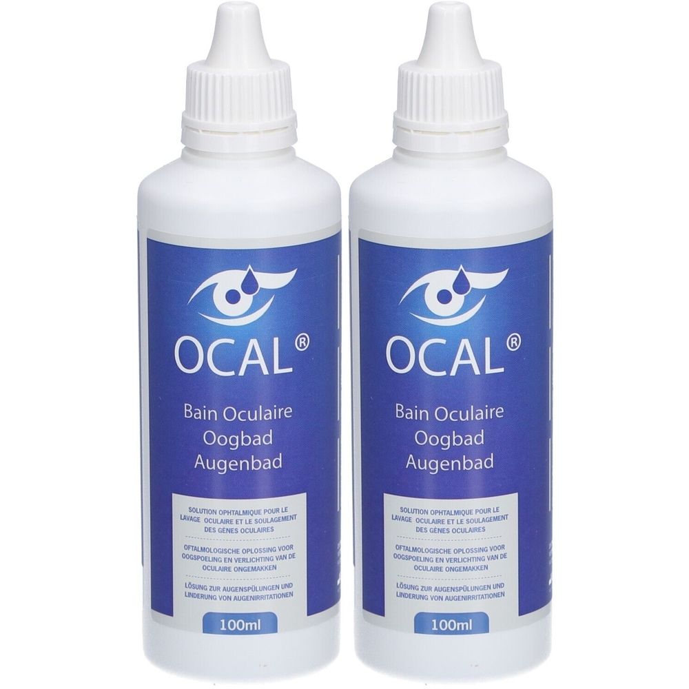 Twee witte flessen met blauw etiket. Opschrift: OCAL, Bain Oculaire, Oogbad, Augenbad. Onderaan: 100ml.