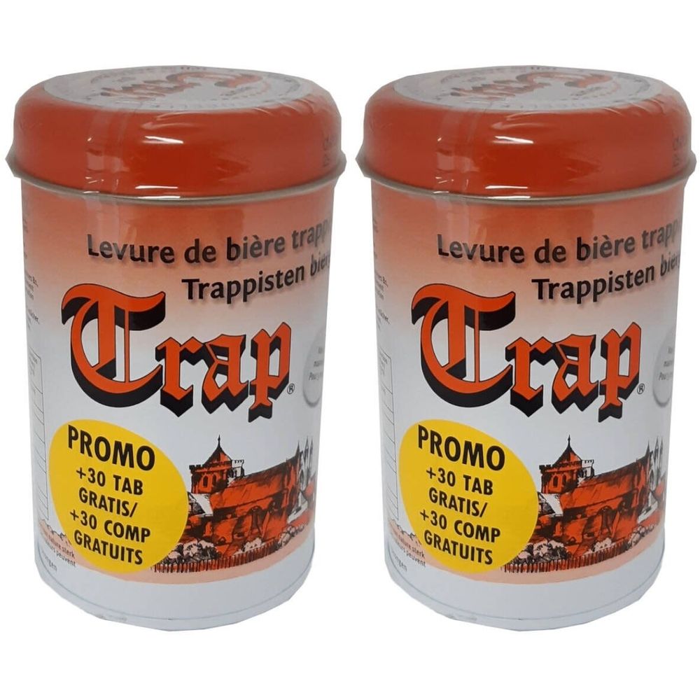 Twee cilindervormige blikken met deksels. Opschrift: Trap, Levure de bière trappisten. Promo: +30 Tab Gratis / +30 Comp Gratuits.