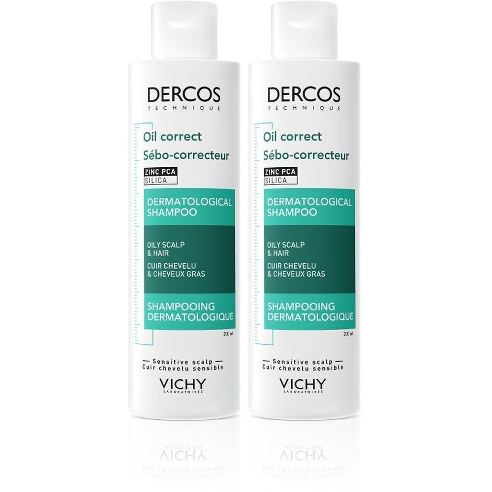 Deux flacons blancs de Dercos Shampooing Dermatologique. Inscription : Oil correct, Sébo-correcteur, pour cuir chevelu gras.