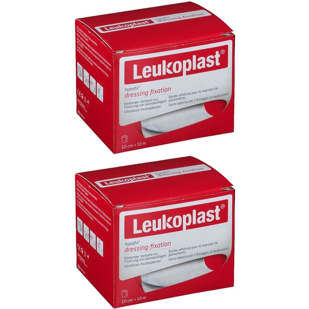 Deux boîtes rouges avec le logo blanc Leukoplast. Inscription : dressing fixation, 10 cm x 10 m.