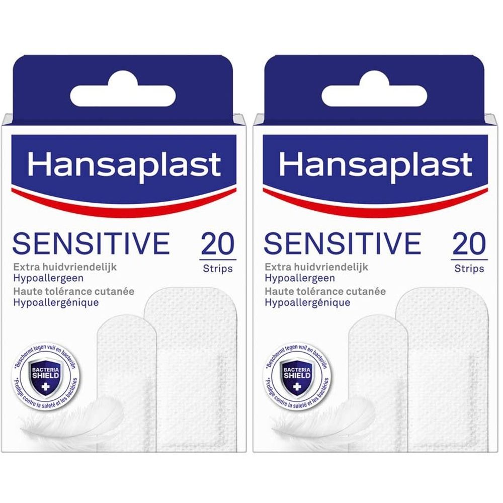 Deux boîtes de pansements Hansaplast Sensitive. Inscription : Sensitive, 20 strips. Hypoallergénique, haute tolérance cutanée.
