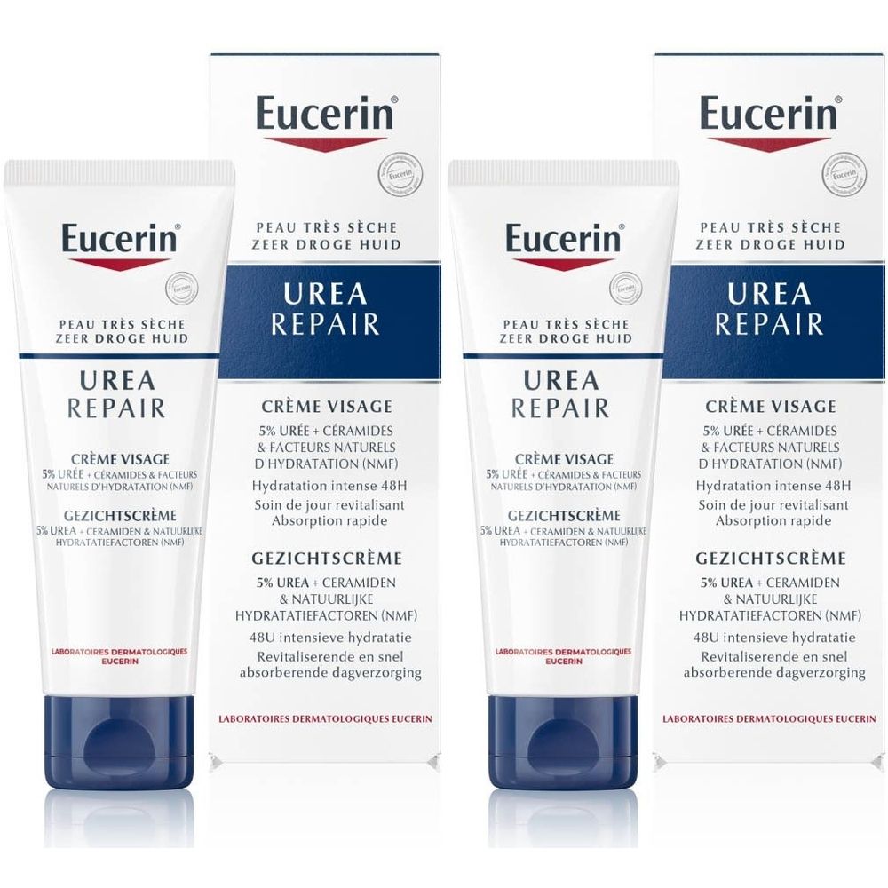 Plusieurs tubes et étuis de crème visage Eucerin UreaRepair. Tubes blancs avec bouchon bleu, à côté de boîtes blanches avec texte bleu.
