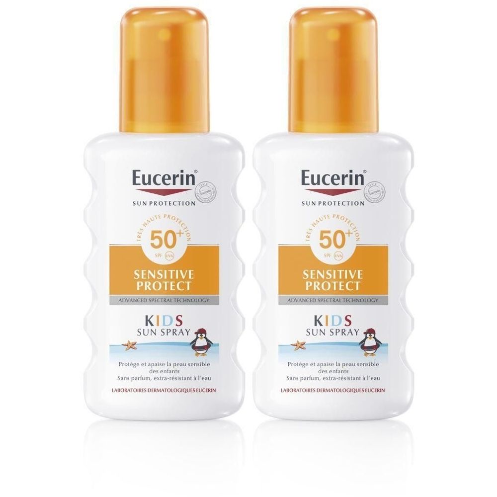 Twee witte flessen met oranje doppen. Opschrift: Eucerin Sun Protection 50+ Sensitive Protect Kids Sun Spray.