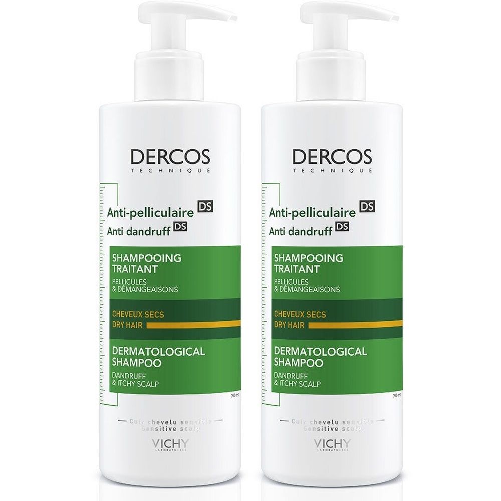 Twee witte flessen met pomp. Opschrift: Dercos Anti-roos Shampoo, voor droog haar. Groene en gele accenten.