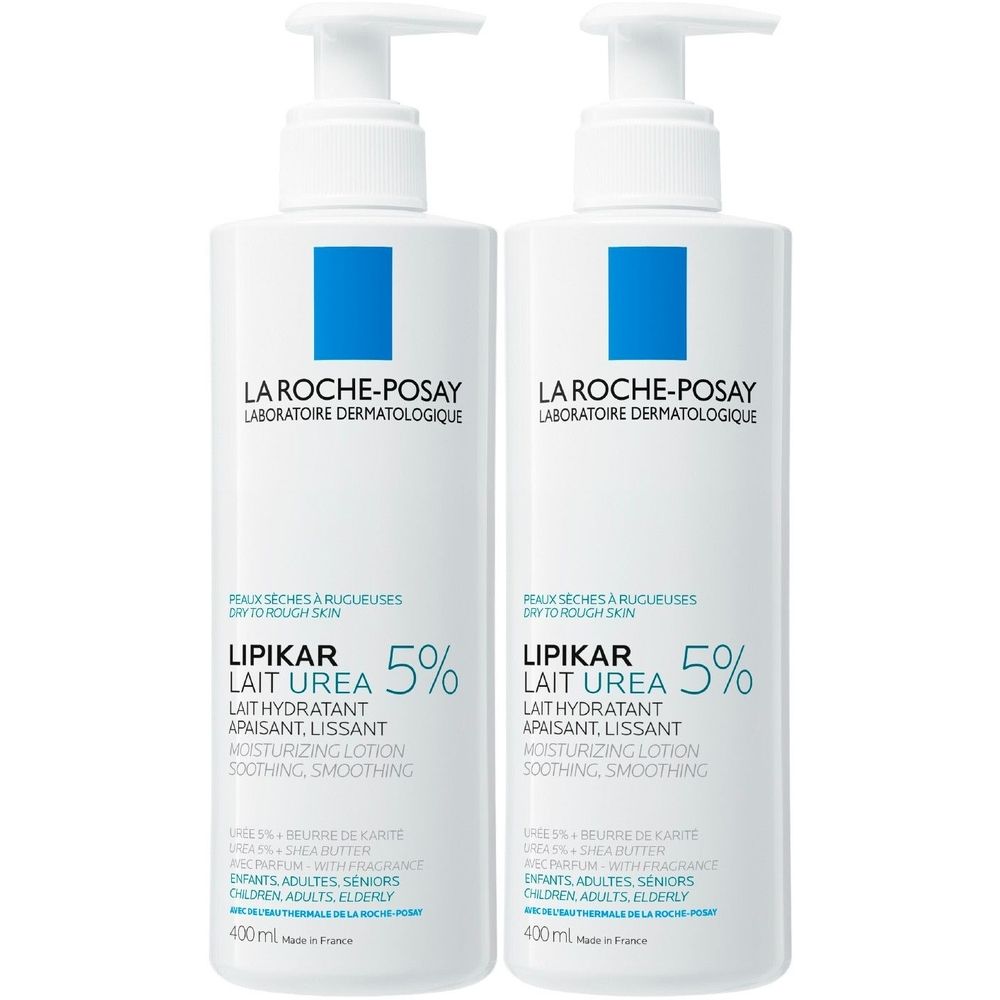Twee witte flessen La Roche-Posay Lipikar Lait Urea 5%. Blauwe vierkante markering. Pompdop.