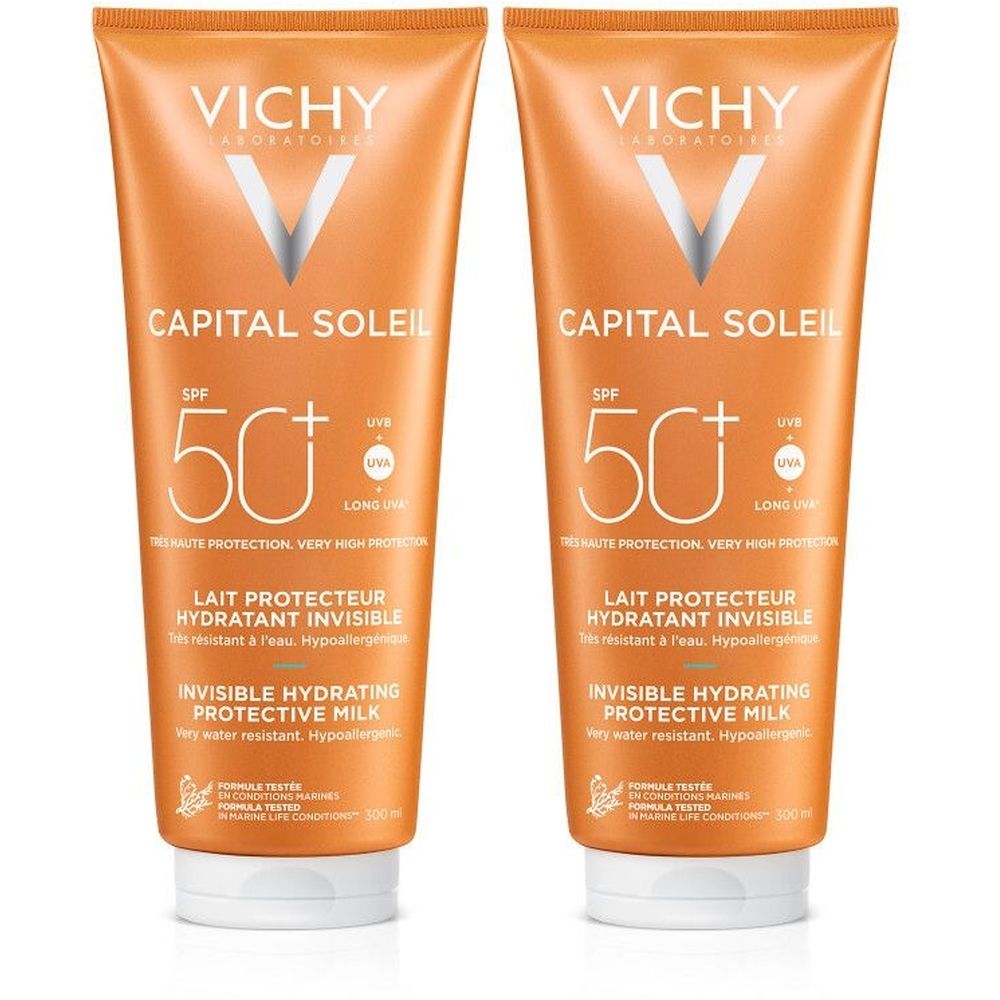Twee tubes Vichy Capital Soleil Lait Hydratant Fraîcheur SPF50+. Oranje verpakking, witte dop. Tekst: SPF 50+.