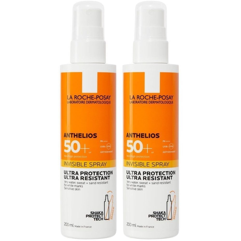 Twee flessen La Roche-Posay Anthelios 50+ Invisible Spray. Witte sproeikoppen, oranje etiketten met productinfo en merklogo.