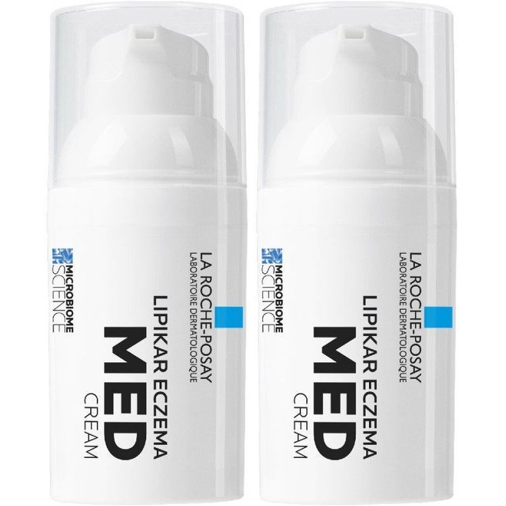 Twee witte crèmes met pomp. Opschrift: LIPIKAR ECZEMA MED CREAM, La Roche-Posay.