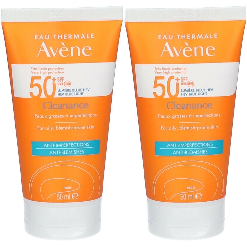 Deux tubes de crème solaire. Tubes orange avec bouchon blanc. Inscription : Avène, Cleanance, SPF 50+, pour peaux grasses à imperfections.