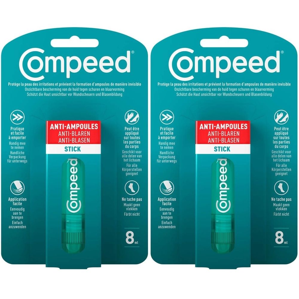 Deux emballages de Compeed Stick Anti-Ampoules. Stick vert transparent dans un blister. Inscription: Anti-Ampoules, Anti-Blaren, Anti-Blasen.