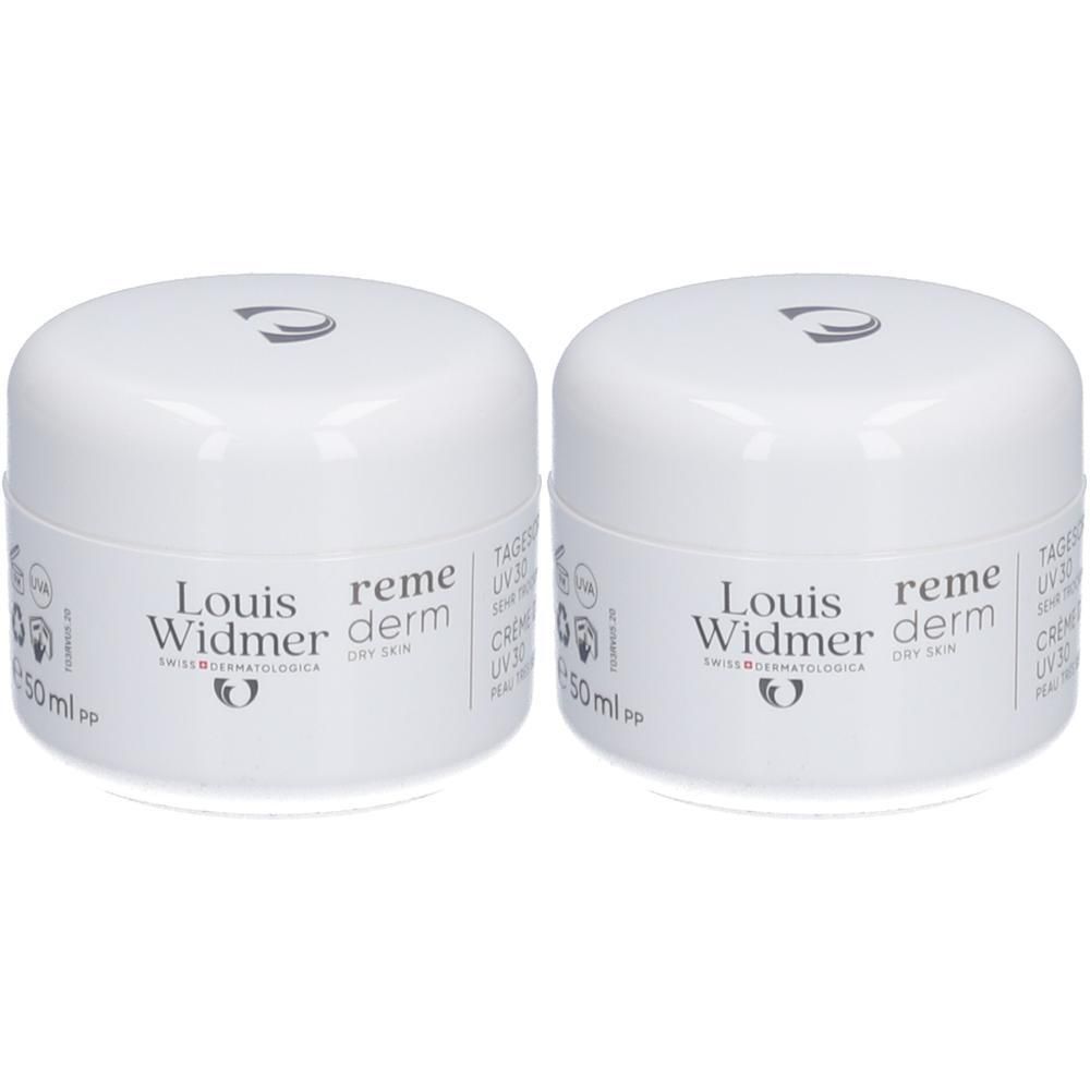 Twee witte crèmetiegels met Louis Widmer logo en opschrift Remederm. Opschrift: Dagcrème UV30. 50ml.
