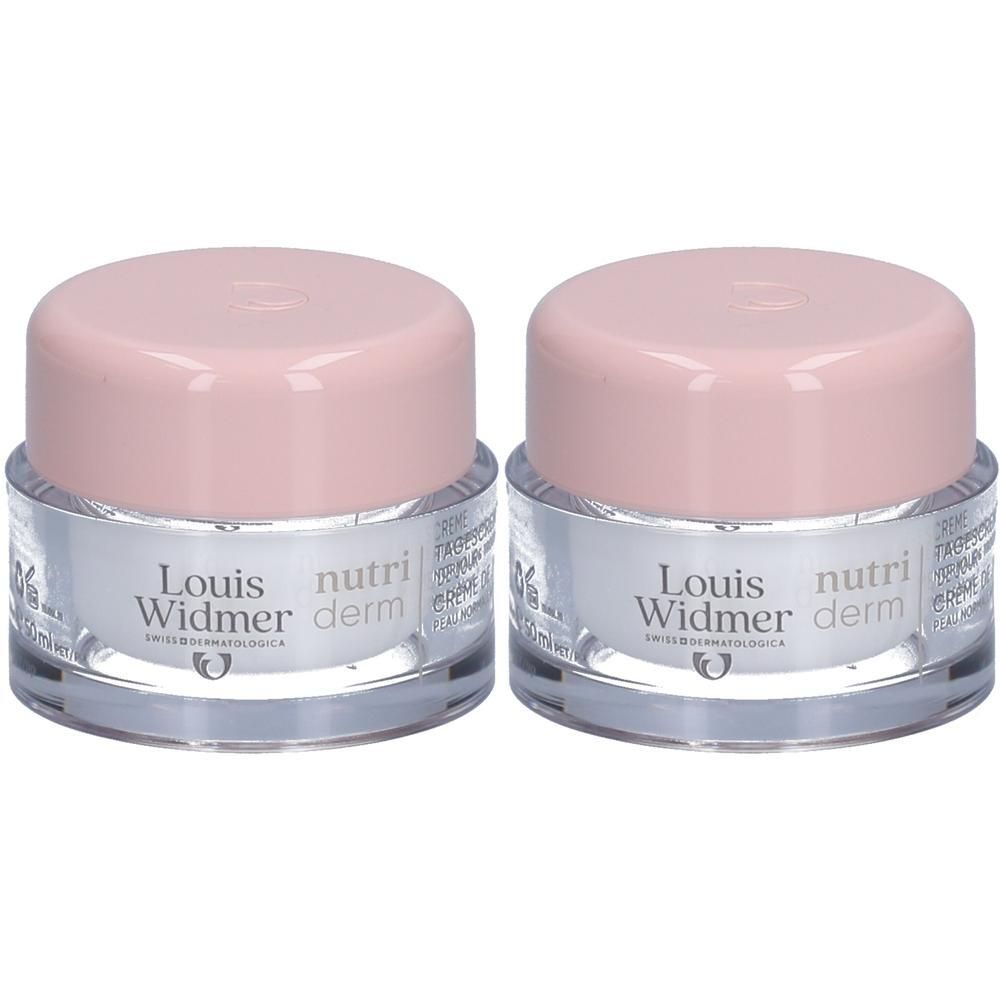 Twee potjes Louis Widmer Nutriderm, roze deksels, transparante potjes. Opschrift: Nutri Derm.