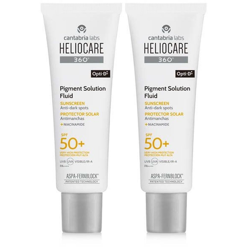 Twee tubes Heliocare 360 Pigment Solution Fluid SPF50+. Witte tubes met grijze doppen. Tekst: Zonnebrandcrème, anti-donkere vlekken, +Niacinamide.
