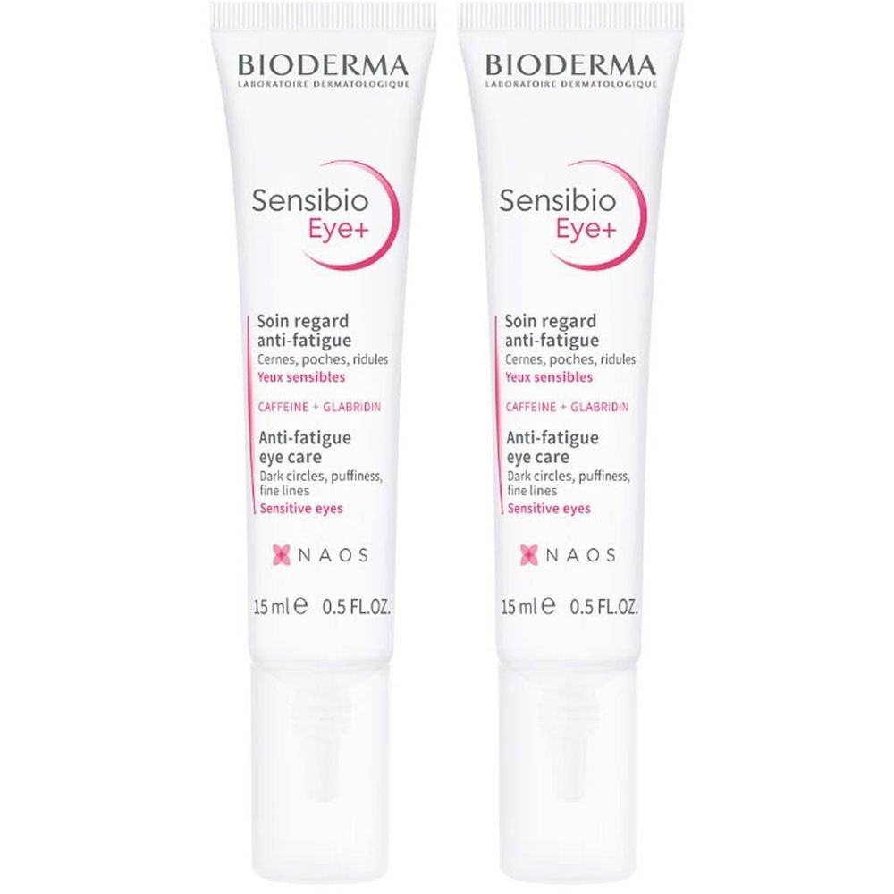 Twee tubes Bioderma Sensibio Eye+ Anti-vermoeidheid. Witte tubes met roze accenten en productinformatie. 15 ml.