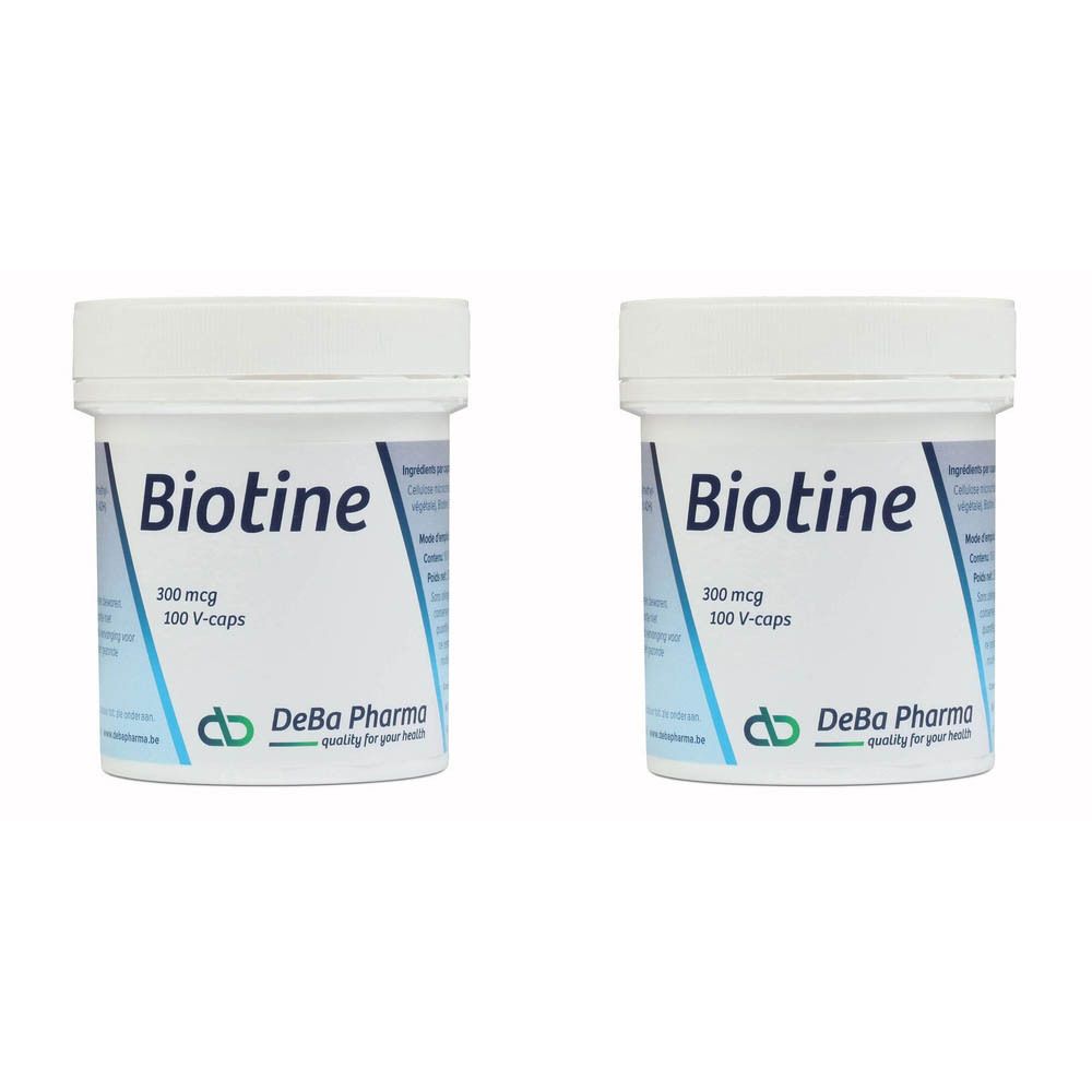 Deux boîtes blanches avec "Biotine". Inscription: 300 mcg, 100 V-caps. Marque: DeBa Pharma.