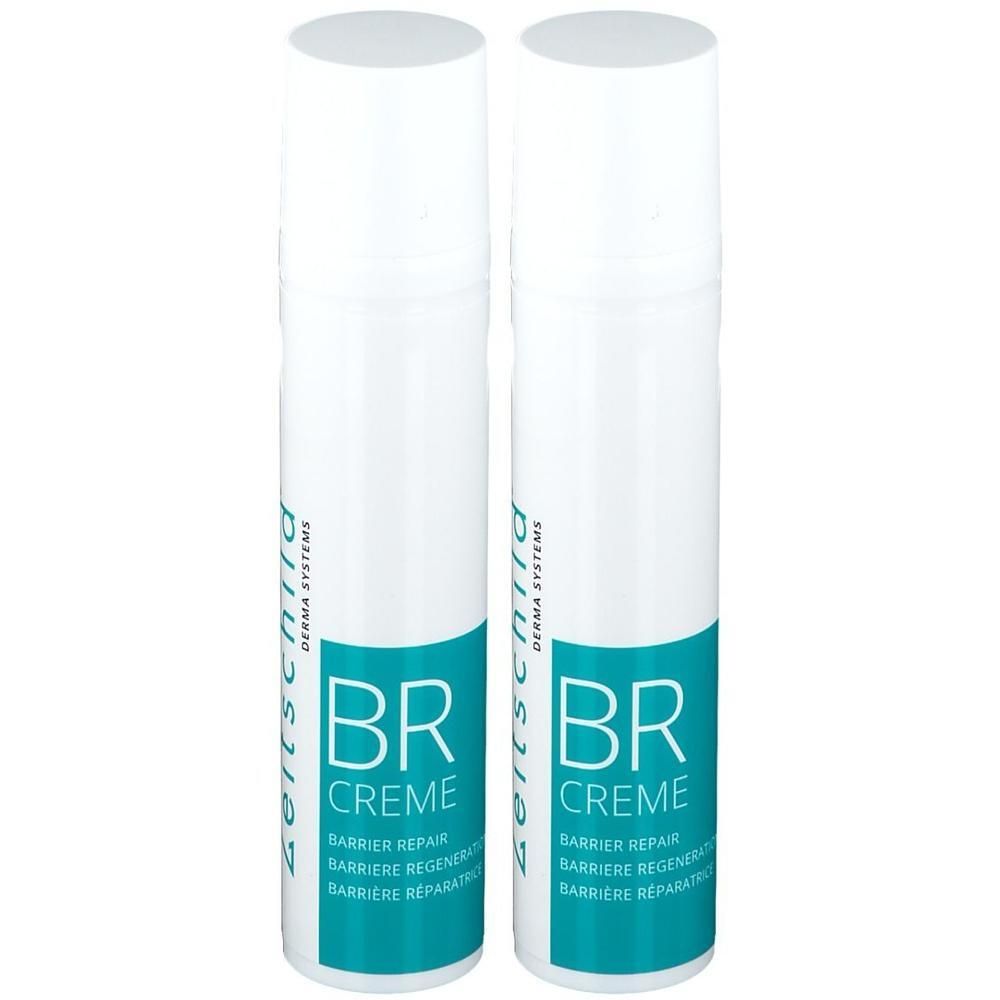 Twee witte spuitflessen met blauw etiket. Opschrift: BR Crème, Barrier Repair. Zeitschild Derma Systems logo.