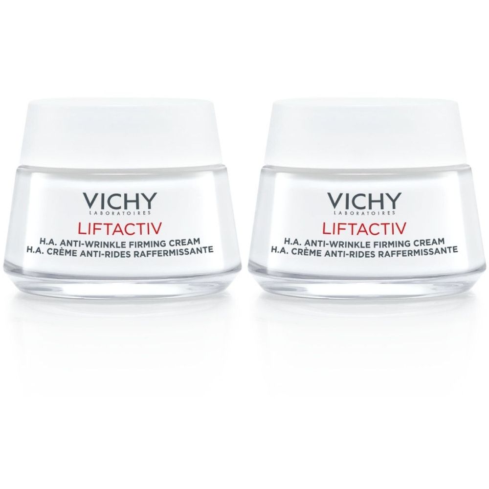 Deux pots de crème avec couvercles blancs et verre transparent. Inscription : VICHY LIFTACTIV H.A. Crème Anti-Rides Raffermissante.