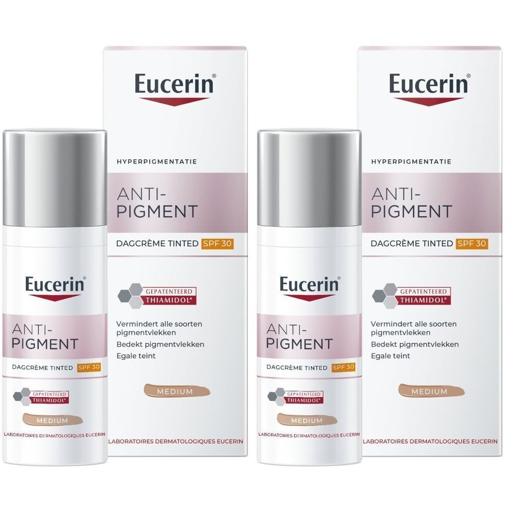 Eucerin Anti-Pigment Dagcrème Tinted Medium SPF 30. Fles en verpakking. Wit, roze en bruin. Tekst.