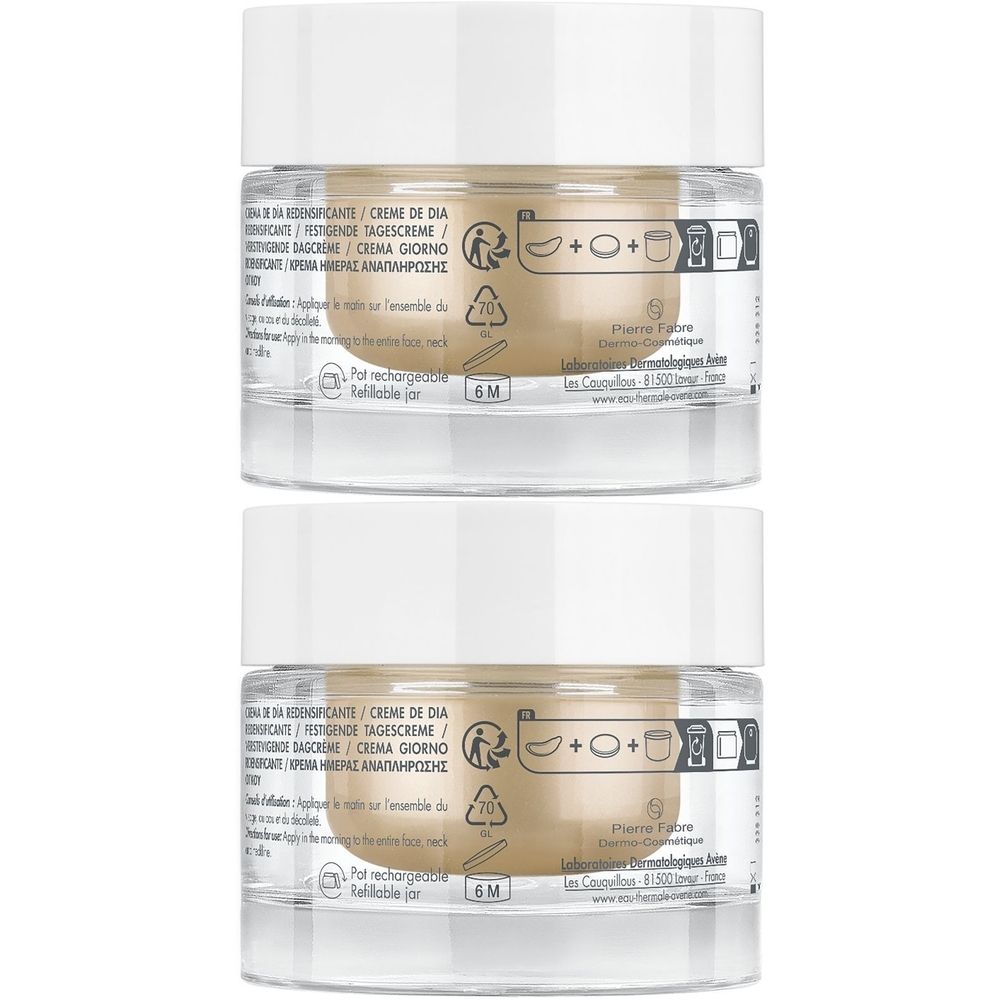 Deux pots de crème avec couvercles blancs. Inscription : Crème de jour. Symboles et texte imprimés. Symbole 6M.